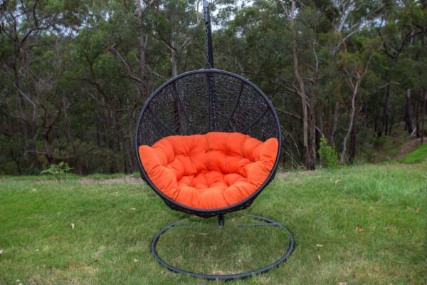 Marrakesh Black Wicker Hanging Chair with Orange Cushion